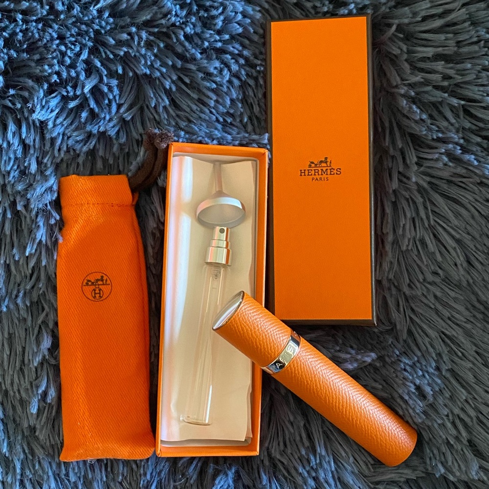 SOLD*BNIB Authentic Hermes refillable perfume atomizer orange epsom leather PHW.